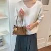 Bolsa pequena quadrada popular de estilo coreano para mulheres deste ano, novidade do Outono de 2026, cor sólida, simples, bolsa de ombro único, para o trabalho, bolsa transversal