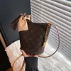 Bolso tipo cubo de alta gama transfronterizo para mujer 2026 nuevo estampado vintage bolso de hombro de lujo ligero para mujer bolso cruzado