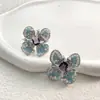 Pendientes de Flor y Mariposa de Circonita Coloreada Transfronterizos Lujo Ligero Nicho Pendientes de Botón Temperamento Versátil Alto Nivel Sensación Adornos para Orejas Al por Mayor Mujeres