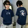 Camiseta de manga larga para niños, nuevo modelo 2026, camiseta básica para niños talla mediana y grande, top elegante a rayas de algodón puro para niños, imitación de dos piezas