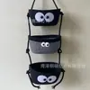 Cesta colgante de tres capas del fabricante Cesta de cuerda de algodón para Año Nuevo Decoración Cesta de almacenamiento de cosméticos de tres Ouli de dibujos animados Cesta para el hogar montada en la pared