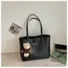 Bolsa de gran capacidad para el día a día para mujer, bolso de hombro versátil casual y elegante, bolso tote moderno y simple, bolsa de nicho