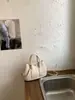 Bolso de Mano de Diseño de Moda de Nicho para Mujer 2026 Nuevo Estilo Coreano Bolso Cubo para Viajes Diarios Bolso de Hombro Único Cruzado Transfronterizo