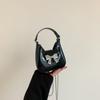Bolsa infantil 2024 nueva moda europea y americana lazo mini bolso de mano charol cadena brillante bolso bandolera comercio exterior