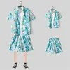 Camisa floral de manga corta, Ropa de playa de Hainan, Estilo hawaiano de Sanya, Conjunto de pantalones cortos finos de verano para hombre y pareja de viaje a Tailandia