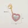 Espejo de Maquillaje Portátil con Forma de Corazón de Cuero Llavero Espejo Mini Colgante para Bolso Multicolor Venta al por Mayor de Fábrica en Stock