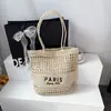 Bolso de paja casual de moda estilo coreano, nuevo para la primavera de 2026, transfronterizo, bolso de hombro de gran capacidad, bolso tote de alta gama