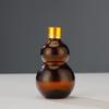 Botella de Vidrio a Prueba de Luz de Calabaza Única Marrón Botella con Atomizador de Doble Calabaza Multiespecificación Botella Pequeña de 30ml Botella con Rodillo de 50ml