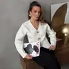 Amazon Cardigan de Punto con Cuello Corto Transfronterizo Primavera y Otoño Nuevo Ajuste Delgado Botón Metálico Color Sólido Suéter Ropa para Mujer