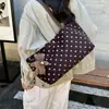 Bolso de mano de lunares estilo coreano para mujer, nueva colección 2026, bolso tote simple y elegante para el trabajo, bolso de hombro moderno y estéticamente agradable