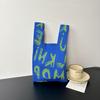 Bolsa Tricotada com Senso Avançado Nova Bolsa de Pulso de Desenho Animado Bolsa de Férias Bolsa de Mão Nicho Versátil Bolsa de Mão Bolsa de Presente