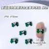 Las Decoraciones para Uñas de Aleación con Temática Navideña Son un Éxito de Ventas Transfronterizo, Incluyendo Rojo Ancla, Verde Navidad, Calcetines Lindos y Decoraciones de Uñas de Bastón