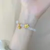 Pulseira de contas da sorte flor de pessegueiro Shihuan Lotus pequena pulseira de ouro de areia antiga pulseira de jade branco atacado