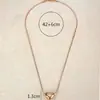 Collar con colgante de corazón de melocotón de acero de titanio, diseño de nicho avanzado para mujer, nueva cadena para la clavícula de lujo ligero 2023