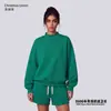 Conjunto de ropa europea y americana para mujer transfronterizo: sudadera casual y shorts, sudadera holgada de forro polar color liso, cuello medio alto, estilo 'dopamine hot girl'