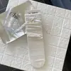 Calcetines de tubo medio de encaje con lazo de perlas estilo coreano para mujer, estilo fino de verano, etiqueta de tela estilo Ins, calcetines holgados estilo ballet