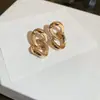 Brincos de Metal Feijão com Agulha de Prata Galvanizada a Ouro Real Brincos Joker Simples de Nicho Brincos de Luxo Leve de Alta Qualidade Atacado Feminino