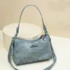 Bolsa de comércio exterior feminina 2025 novo modelo bolsa de mamãe versátil bolsa de ombro de grande capacidade couro macio bolsa tote multicamadas bolsa de axila