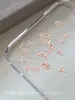Accesorios de aleación para arte de uñas personalizados, mini moños, decoraciones de uñas de macarrón 3D de moda, venta al por mayor en grandes cantidades