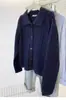 Cardigan de Punto de Lana Pura con Cuello Polo de Punto Trenzado Color Sólido Holgado Abotonado para Principios de Otoño 2025 con un Estilo Elegante para Ir al Trabajo