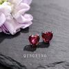 Aretes de moda transfronteriza amor rubí rojo temperamento en forma de corazón aretes simples sintéticos rojo sangre de paloma aretes de moda para niñas