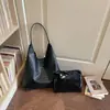 Bolsa casual com padrão trançado para mãe e filha, nova bolsa tote de grande capacidade estilo coreano nicho, bolsa de ombro e axila feminina para o dia a dia