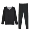 Otoño e invierno nuevo conjunto de ropa interior térmica ajustada con parche de terciopelo traje sin costuras forrado de polar ropa de otoño para hombre pantalones de otoño
