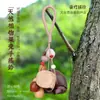Campanilla de mano con forma de cáscara de fruta indonesia de planta natural, colgante para bolso, instrumento de terapia de sonido curativo, carillón de viento, adorno para colgar en el coche, llavero