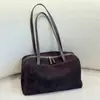 2026 Nuevo Modelo Bolso de Bolos Astra de Fila de Piel de Vaca Esmerilada, Bolso de Hombro Único Minimalista de Alta Gama para Mujer