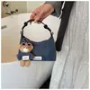 Bolso de mezclilla exquisito y moderno de nicho para mujer, nuevo bolso cruzado versátil de moda 2025, bolso de mano pequeño para salidas