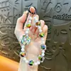 Colgante de Cadena para Teléfono con Cuentas de Rosquilla Llavero para Coche Encanto Lindo para Bolso Pulsera Accesorios Regalo Venta al por Mayor