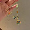 Colar Borboleta Banhado a Ouro Antigo Azul Esmaltado Estilo Novo 2026, Moderno e Versátil, Estilo Chinês, Luxo Leve, Corrente de Clavícula de Alta Qualidade para Mulheres