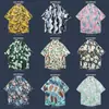 Camisa havaiana floral de manga curta, estilo retrô vetiver de Hong Kong, versão coreana da camisa da moda e estilosa para homens e mulheres, top para casal