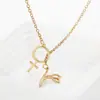 Joyas Transfronterizas Europeas y Americanas Nuevo Comercio Exterior Día de la Madre Moda Personalidad Cruz Dorada Tulipán Colgante Collar Mujeres