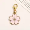 Chaveiro de liga metálica esmaltada com margarida e pingente de florzinha para bolsas de meninas, chaveiro de flor