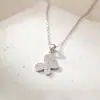 Acero de Titanio Colgante Grabado Incrustado de Diamantes Oro Rosa Anillo Doble Romano Collar de Circonita Accesorios para Mujer Venta al por Mayor Versátil