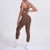 Conjunto de Dos Piezas para Fitness y Yoga: Sujetador Deportivo Cruzado en la Espalda de Textura Cepillada Nude Europeo y Americano y Leggings con Bolsillo Levanta Glúteos