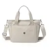 Bolsa de Tecido de Nylon Transfronteiriça Nova Bolsa de Mão Feminina Multifuncional Portátil Grande Capacidade Versátil Casual Bolsa de Ombro Atacado
