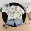 Conjunto de Verão Moderno com Manga Curta para Meninos 2026 Novo Conjunto de Verão Conjunto Estiloso de Manga Curta com Bolsos Diagonais Roupas da Moda