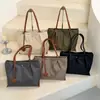 2026 Nueva Bolsa de Mano de Nylon para Mujer de Gran Capacidad para el Trabajo Bolso de Hombro Único Bolso de Mano Versátil Retro Bolso Sencillo de Albóndiga
