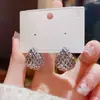 Lujo Ligero y Sensación de Alta Gama, Pendientes de Perla en Forma de Corazón para Mujer, Diseño de Nicho Otoño e Invierno, Pendientes Circulares Versátiles, Pendientes Elegantes
