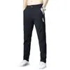 Pantalones casuales de seda de hielo directo de fábrica para hombre, estilo delgado de verano, versión coreana, corte ajustado, empalmado, a la moda, moderno, pantalones de pierna recta holgados