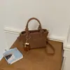 Bolso Cubo de Textura Tejida de Gama Alta de Nicho Moda Retro Bolso Cruzado Versátil Elegante de Moda Bolso Cubo para Llevar en la Mano