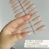 Uñas postizas aplicadas a mano, color nude esmerilado de doble cara, material PMMA moldeado por inyección, se pueden procesar, dimensionar, uñas semiacabadas