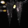 Machica electroforesis negra aretes largos de borla de amor para mujer personalidad exagerada aretes de diamantes aretes al por mayor