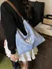 Bolsa tote de gran capacidad para mujer, nueva moda 2026, bolso de hombro versátil, mochila de alta gama para estudiante universitario para salir