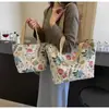Bolsa de Ombro de Grande Capacidade para Mulheres 2025 Nova Bolsa de Lona Estilo Ins Bolsa Tote Bolsa de Mão Classe Bolsa Tote para o Dia a Dia