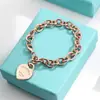 Pulsera para Pareja Etiqueta Inglesa en Forma de Corazón Marca T Cierre de Amor Ot Esmalte Azul Anillo de Corazón Melocotón Joyería Estilo Ins Transfronterizo
