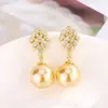 Nuevo Huabi Joyería 2024 Base de Cobre Chapado en Oro Incrustado Perla Dorada Conjunto de Moda con Temperamento para Mujer 14mm Al por Mayor