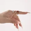 Xinyixin Europa y Estados Unidos acero inoxidable incrustado cuadrado diamante circón anillo completo de diamantes apertura lateral anillo de cola ajustable no se decolora